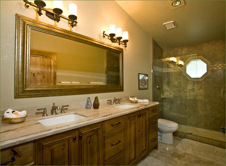 Private en suite bathroom in the master suite includes twin vanities and basins plus a walk-in shower.